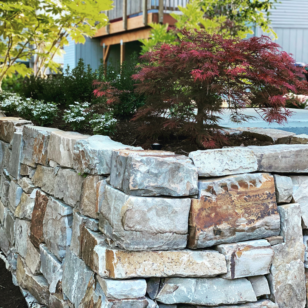Madison Park stacked stone rock wall
